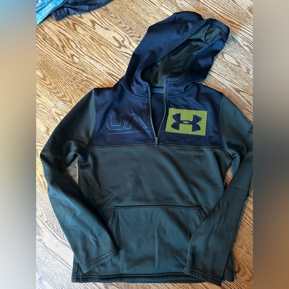 NWOT. Under Armour pull over 1/4 zip hooded sweatshirt. Size YXL